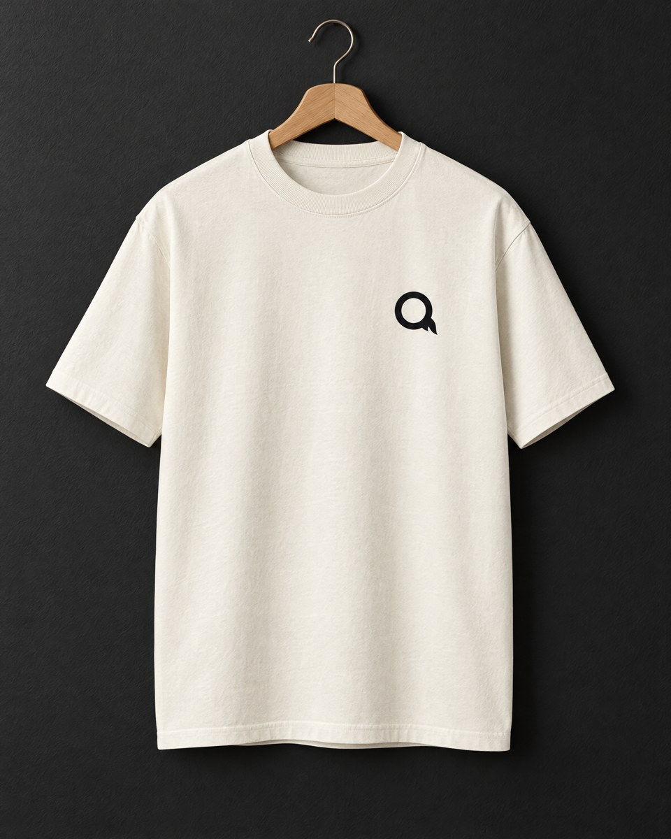 Bone tee with the ink Ember Q chest mark.